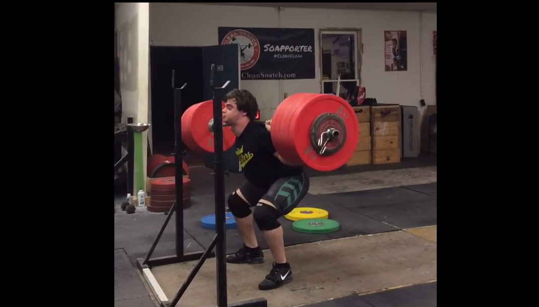 Nathan Damron with a 285kg pause back squat (screen cap via Instagram)