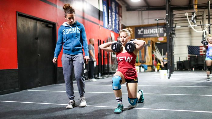 crossfitopen-17point2 Woman performs Open Workout 17.2 in front of a judge at a CrossFit affiliate. Photo courtesy of CrossFit Inc.