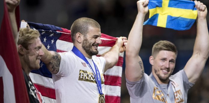 menspodium-2018crossfitgames Mat Fraser, Patrick Vellner and Lukas Hogberg on the podium of the 2018 CrossFit Games. Photo courtesy of CrossFit Inc.